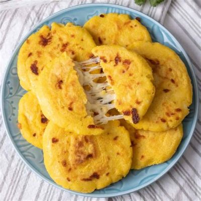  Arepas de Queso: Uma Delícia Frita que Explora Texturas Cremosas e Crocantes!